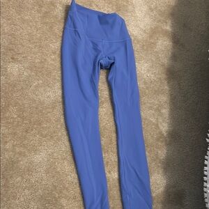 Women purplish leggings size 2 25”